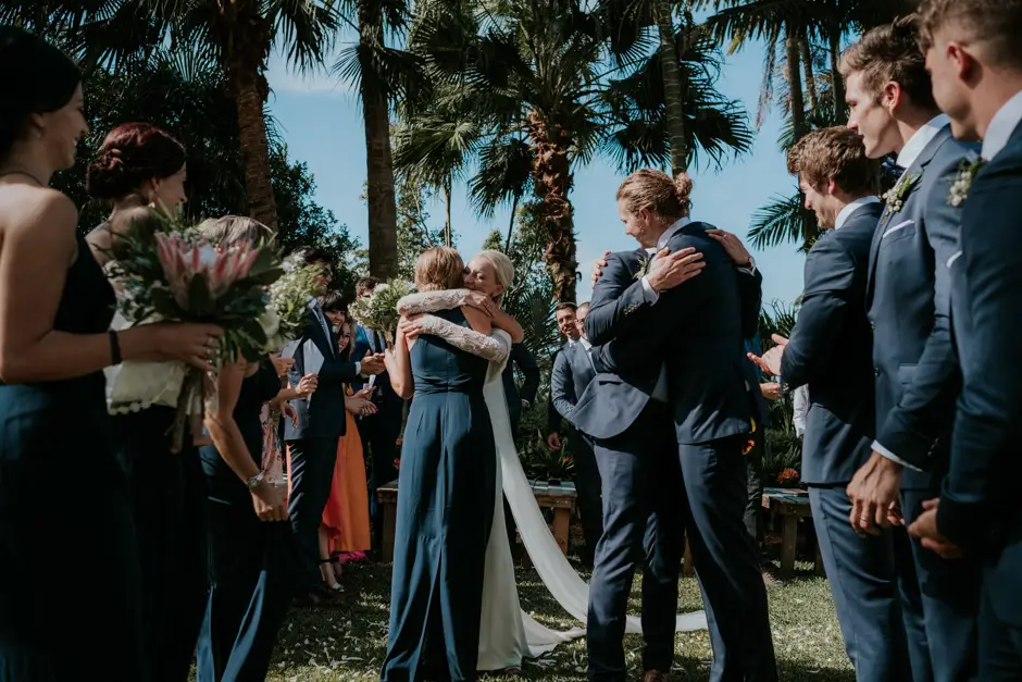 Hugs and congratulations from the bridal party after the ceremony, Eureka