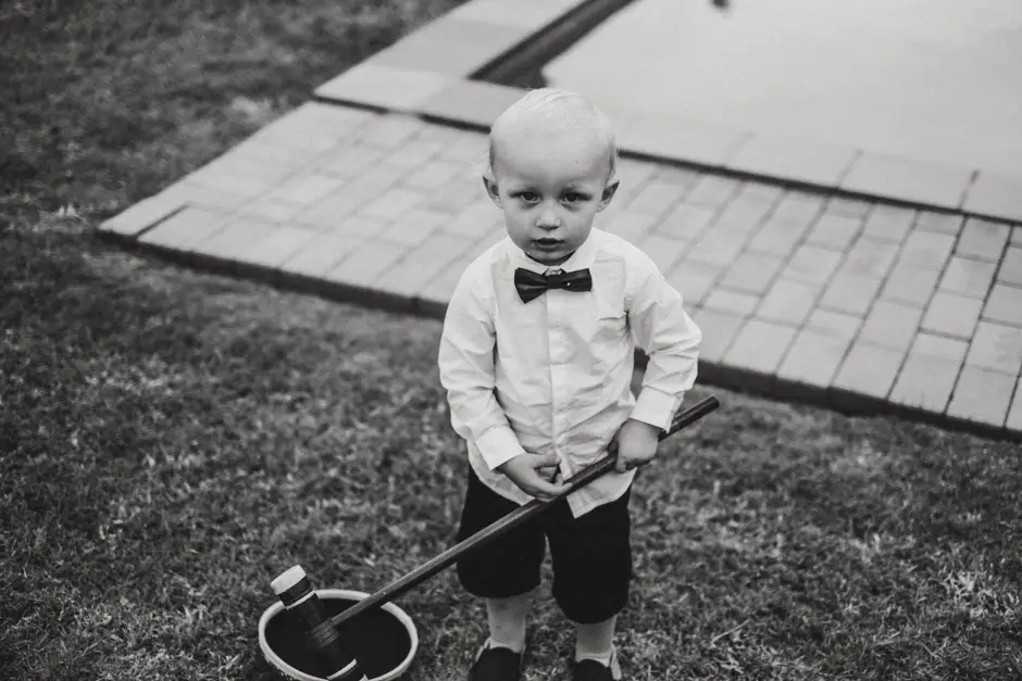 A small boy in a bow tie on the lawn, Eureka