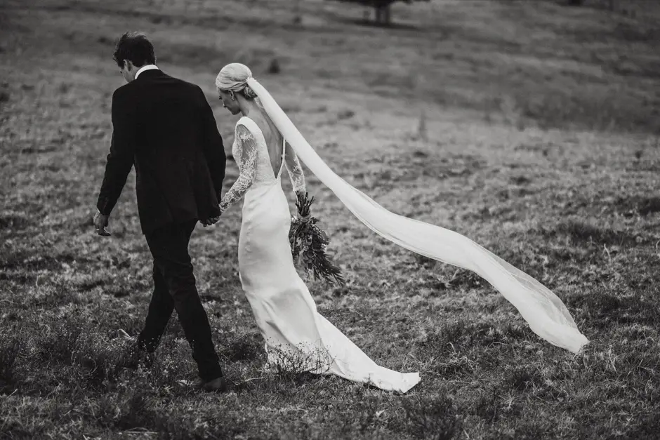 Jessica's veil streaming out behind them in the paddock, Goremans Road