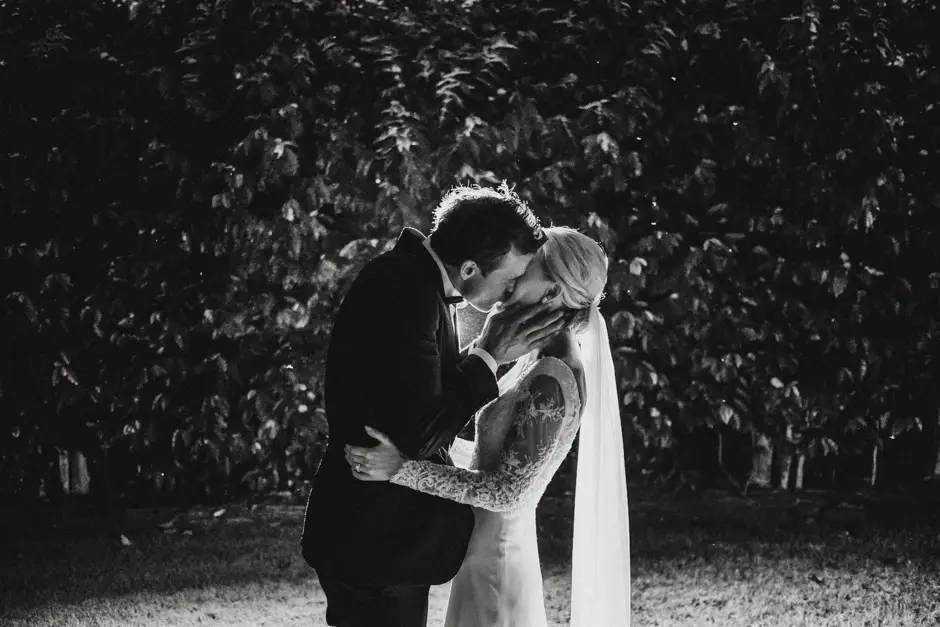 Jessica and Jarrod kissing under the trees at night, Goremans Road