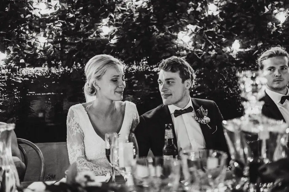 Jessica and Jarrod listening to a speech at the table, Goremans Road