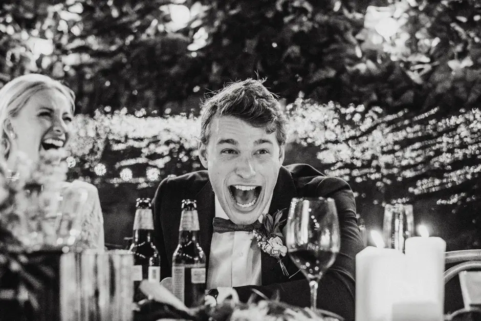 Jarrod laughing hard at the table during the speeches, Goremans Road