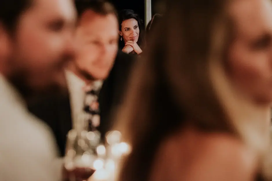Guests laughing at a speech, Eureka