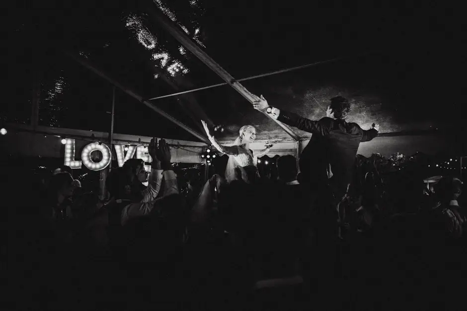 The DJ and dancing crowd beneath the LOVE letters, Goremans Road