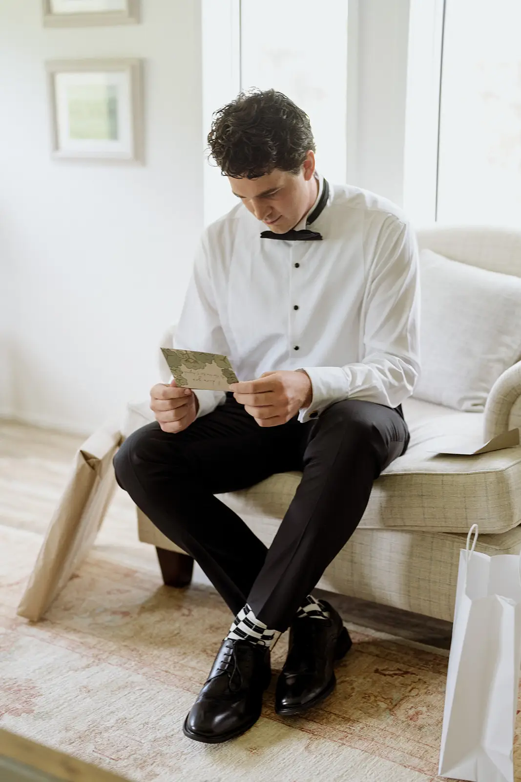 Tom sitting with his gift before the wedding, Newrybar