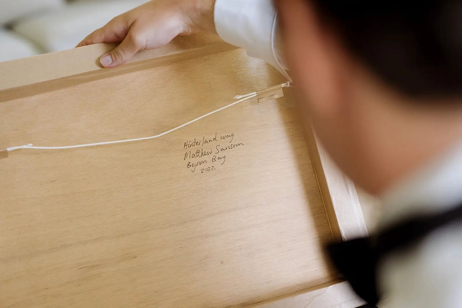 Untying the string on a wrapped gift, Newrybar