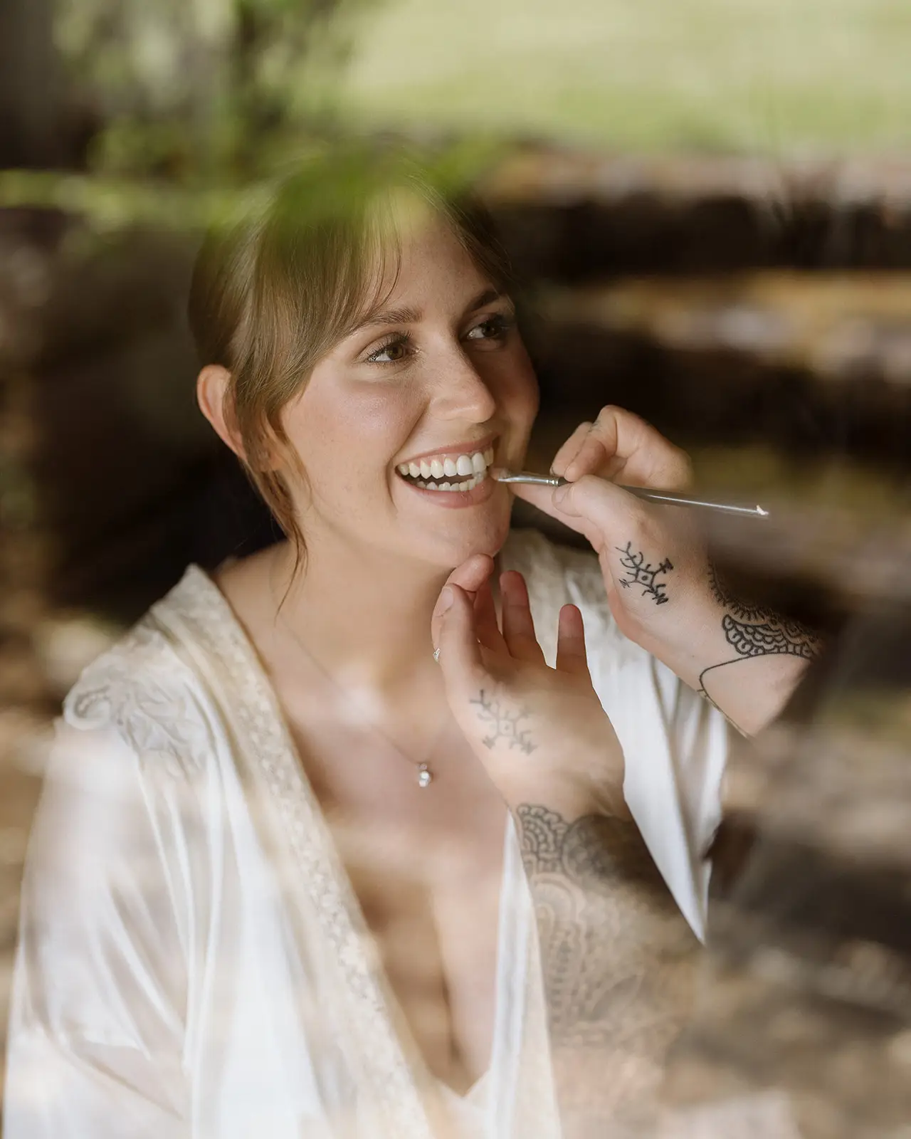 Nim laughing in her robe on the wedding morning, Newrybar