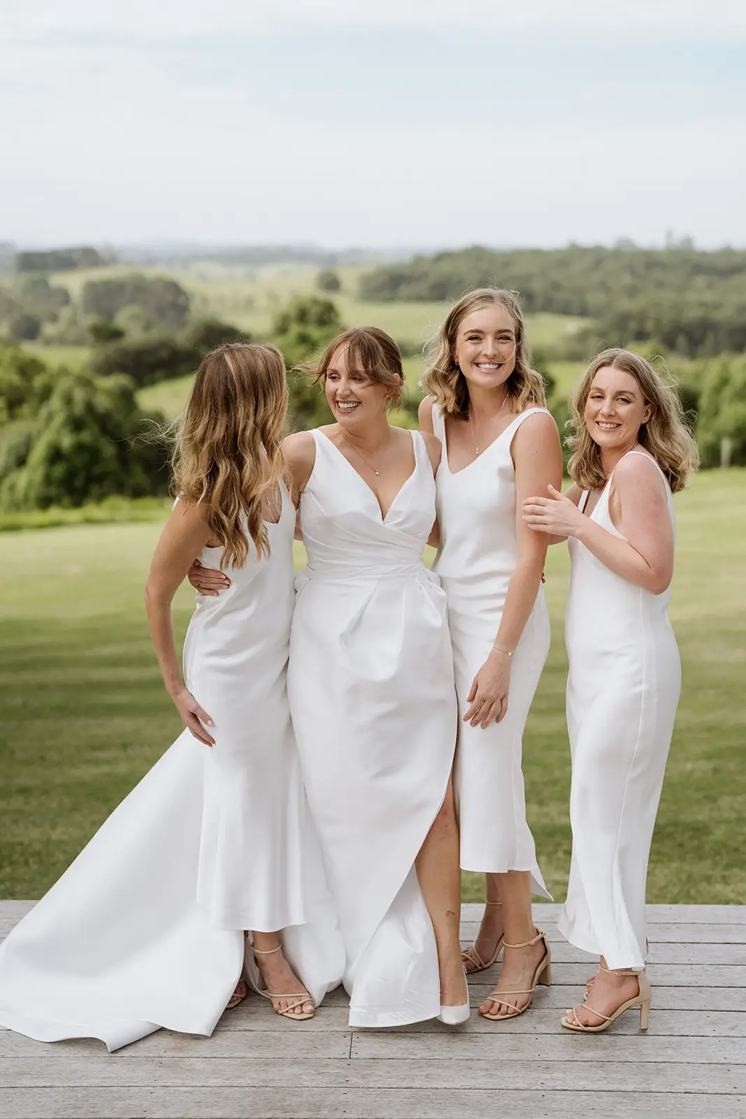 Nim with her bridesmaids on the lawn, Newrybar