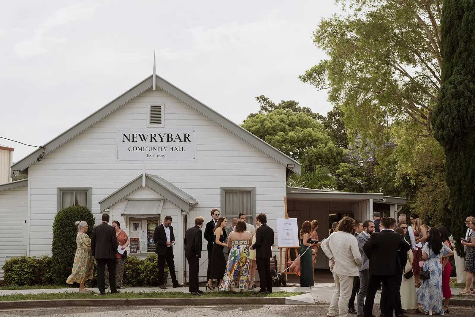Guests arriving at Newrybar School of Arts hall, Byron Bay