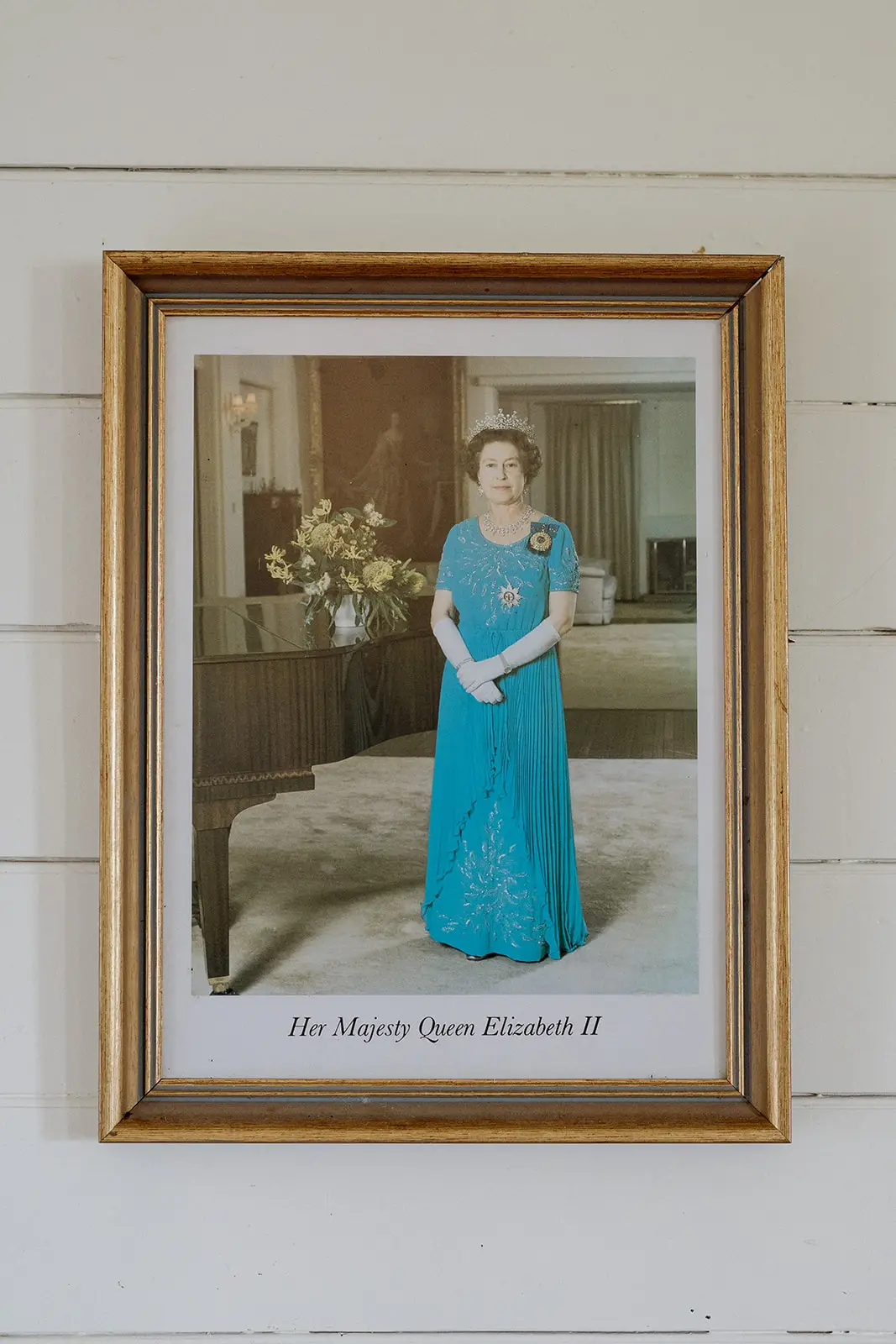 A framed portrait hanging in the Newrybar hall