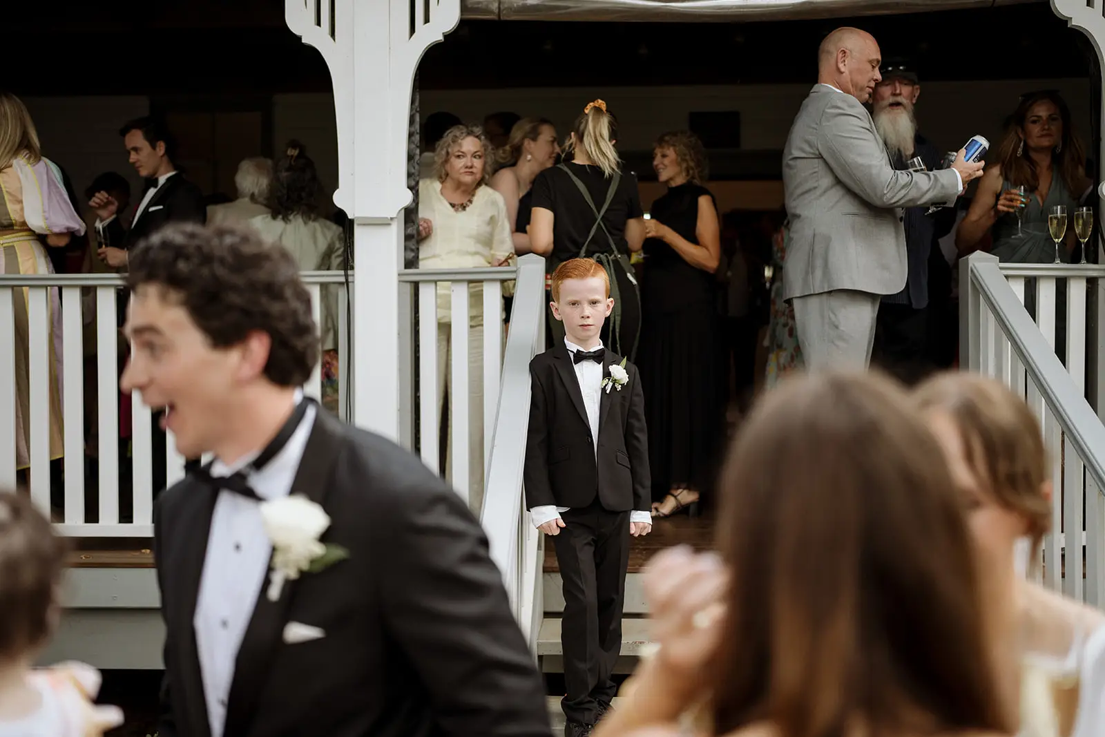 Tom greeting guests on the hall verandah, Newrybar
