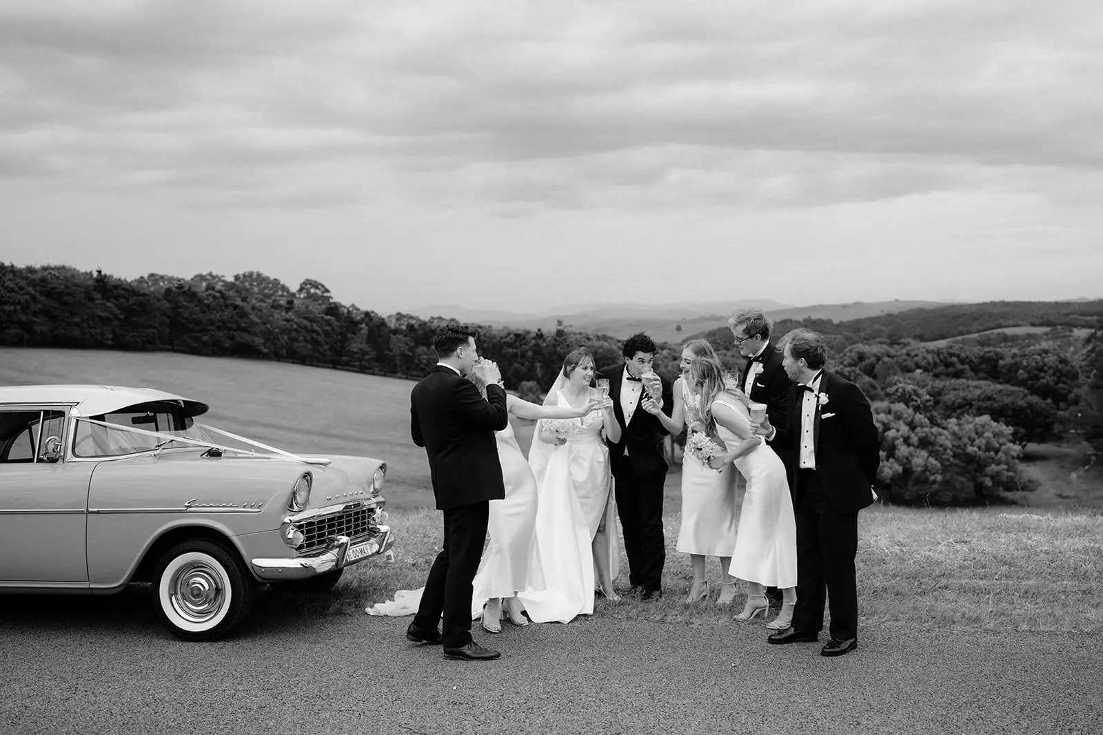 The bridal party beside the vintage car, Byron Bay hinterland