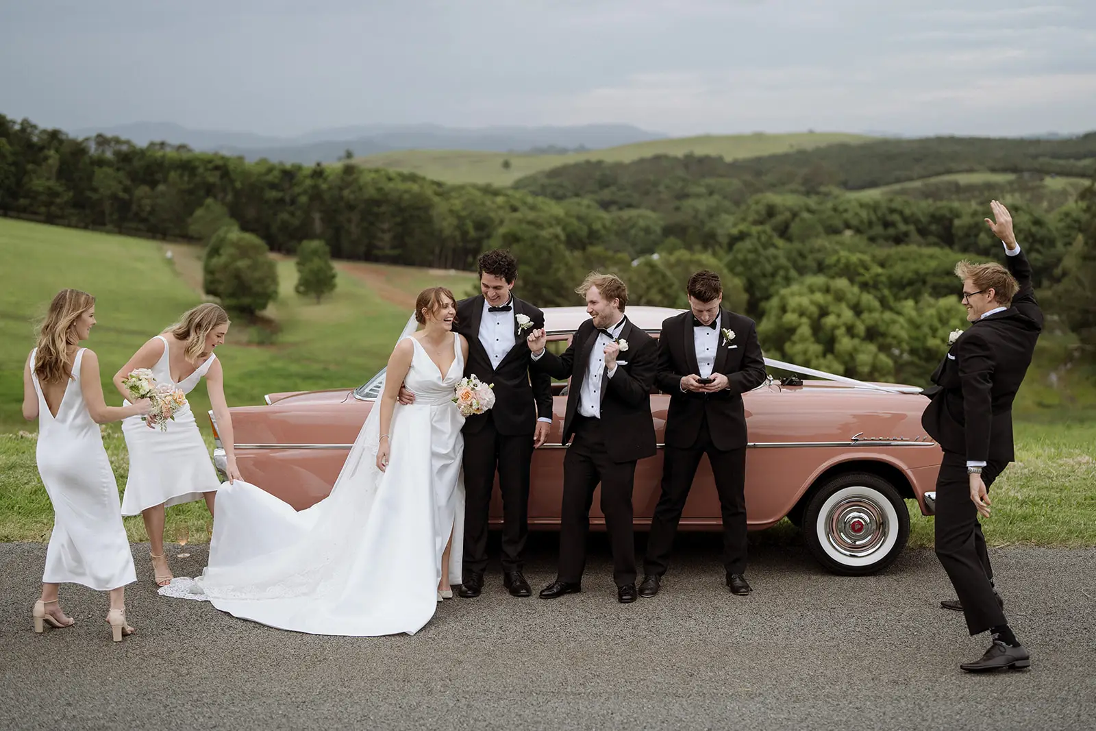 Tom, Nim and their bridal party on the hinterland road, Newrybar