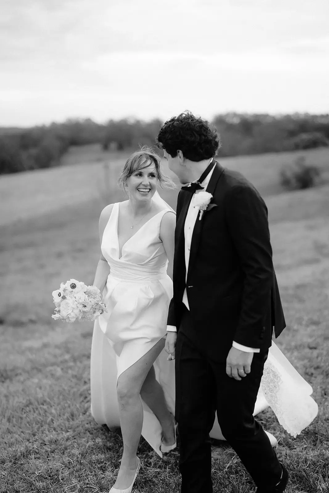 Tom and Nim walking together after the ceremony, Newrybar