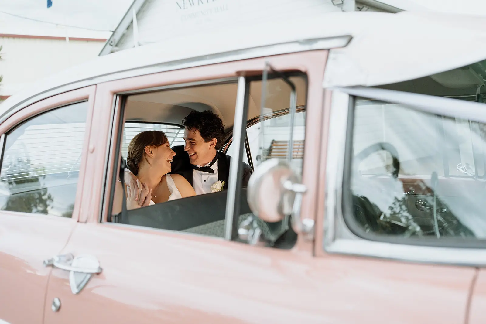 Tom and Nim kissing in the back of the pink car, Newrybar