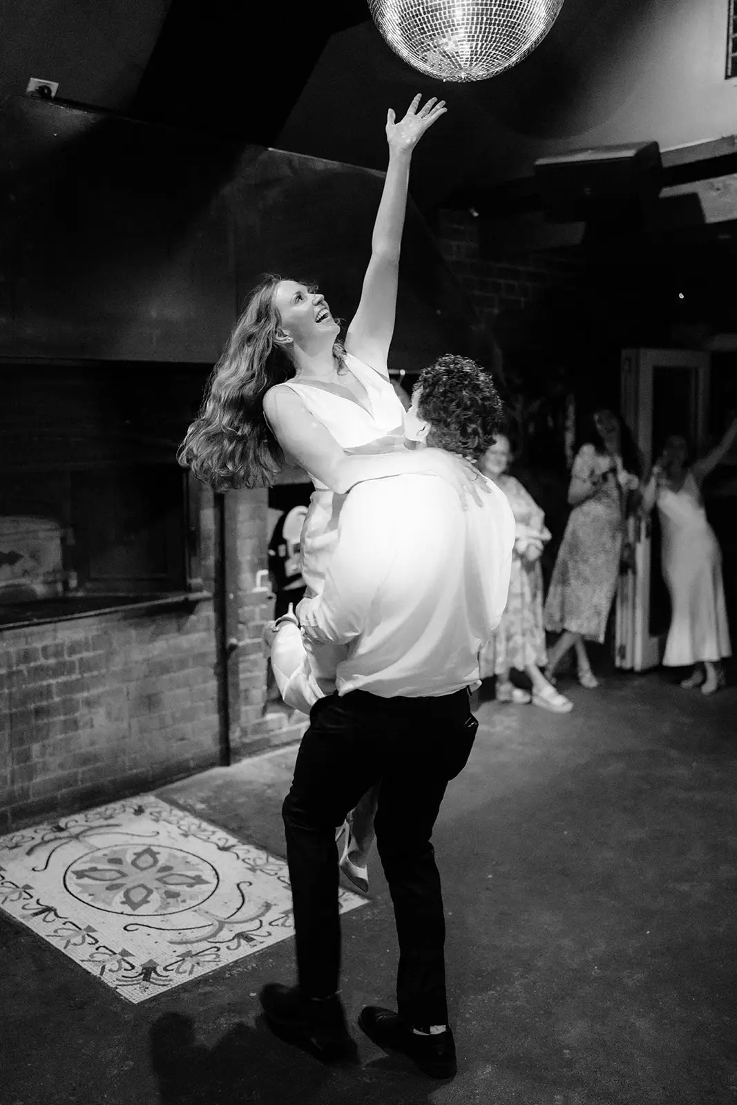 Tom and Nim dancing under the lights, Harvest Newrybar
