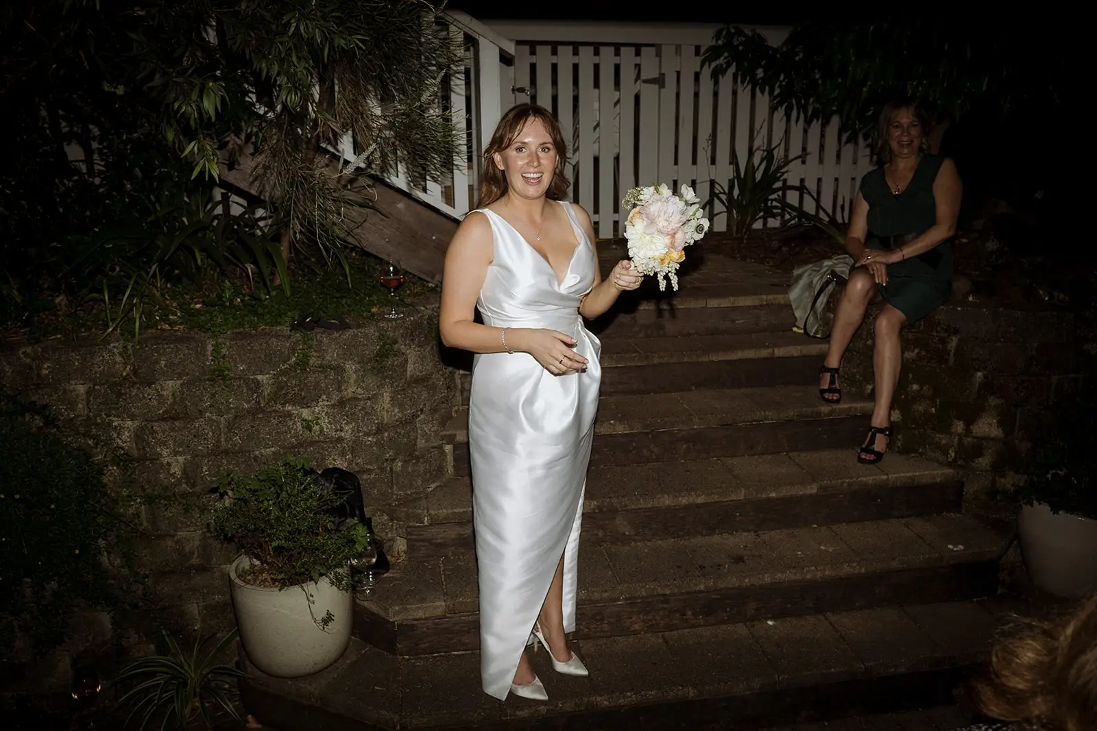 Nim on the steps with her bouquet before the toss, Harvest Newrybar
