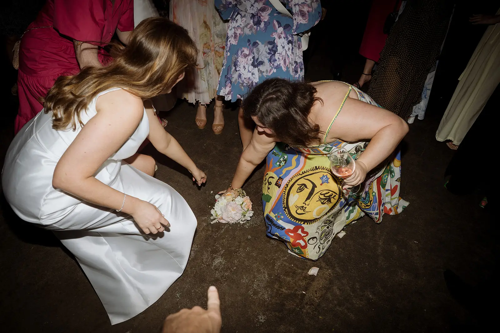 A guest catching the bouquet on the ground, Harvest Newrybar