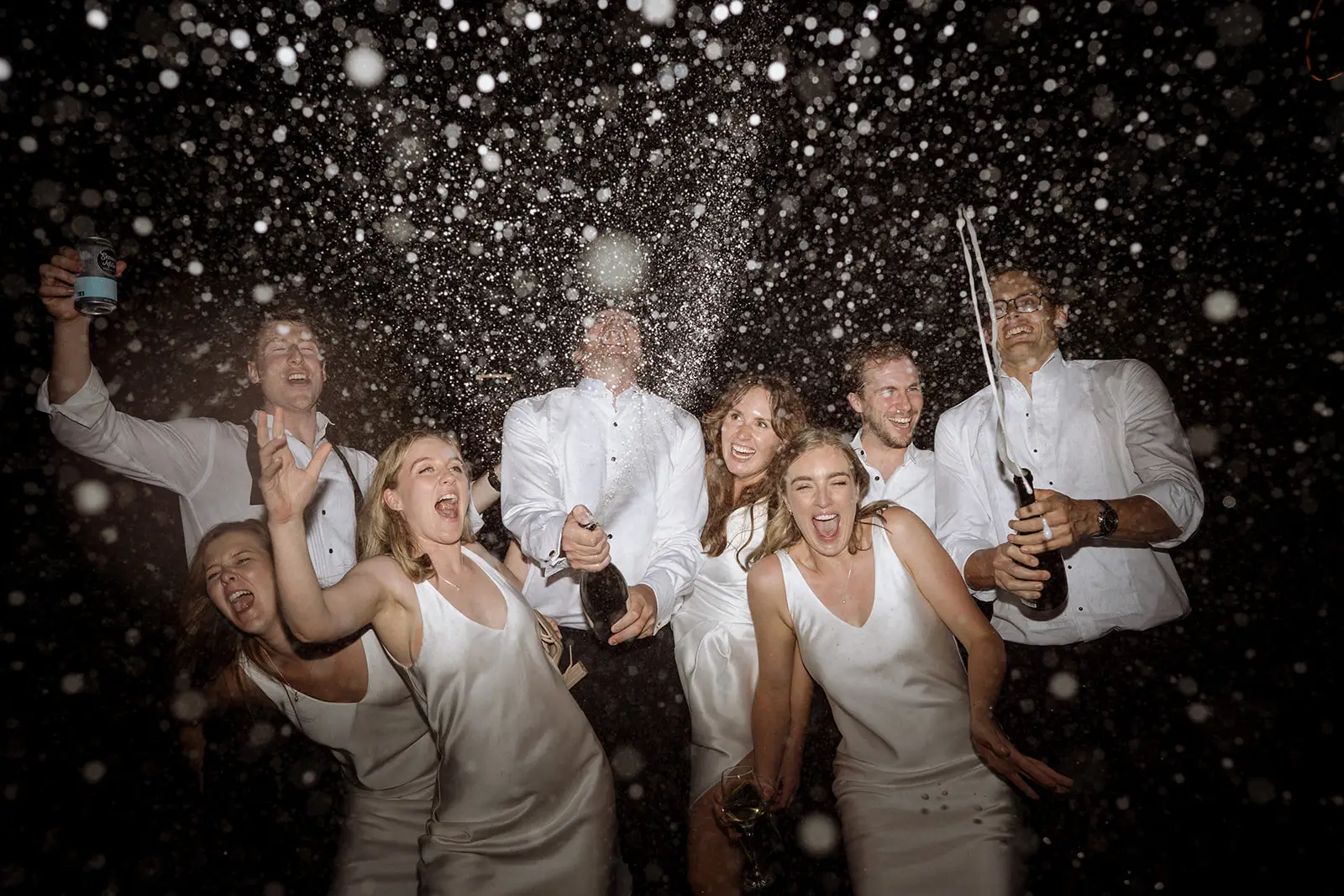 Champagne spraying over the bridal party, Harvest Newrybar