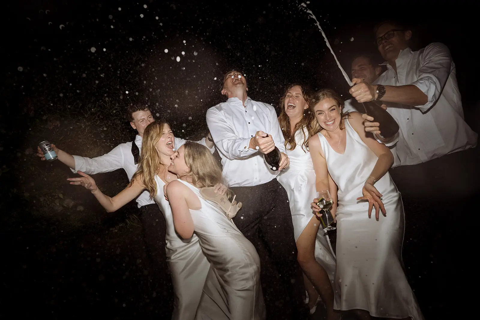 The bridal party in a shower of champagne, Harvest Newrybar