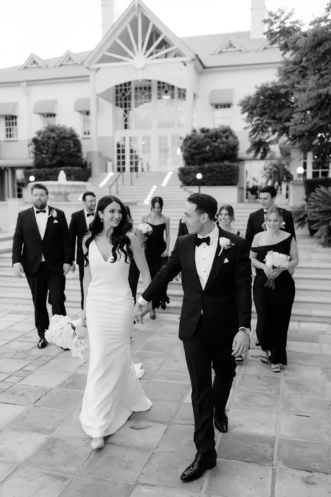 Black and white — walking out through the guests past the Great House, InterContinental Sanctuary Cove