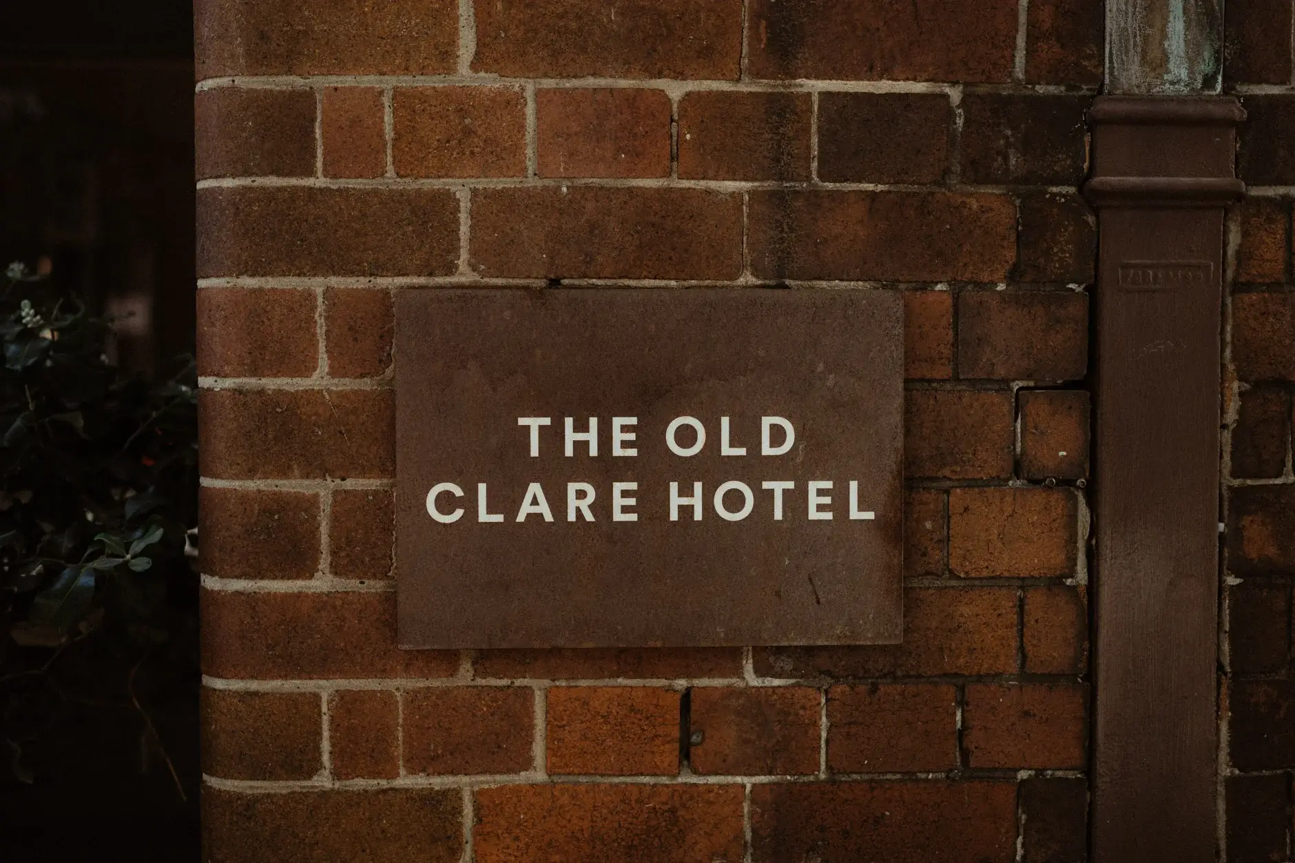 The Old Clare Hotel sign on the red brick, Chippendale