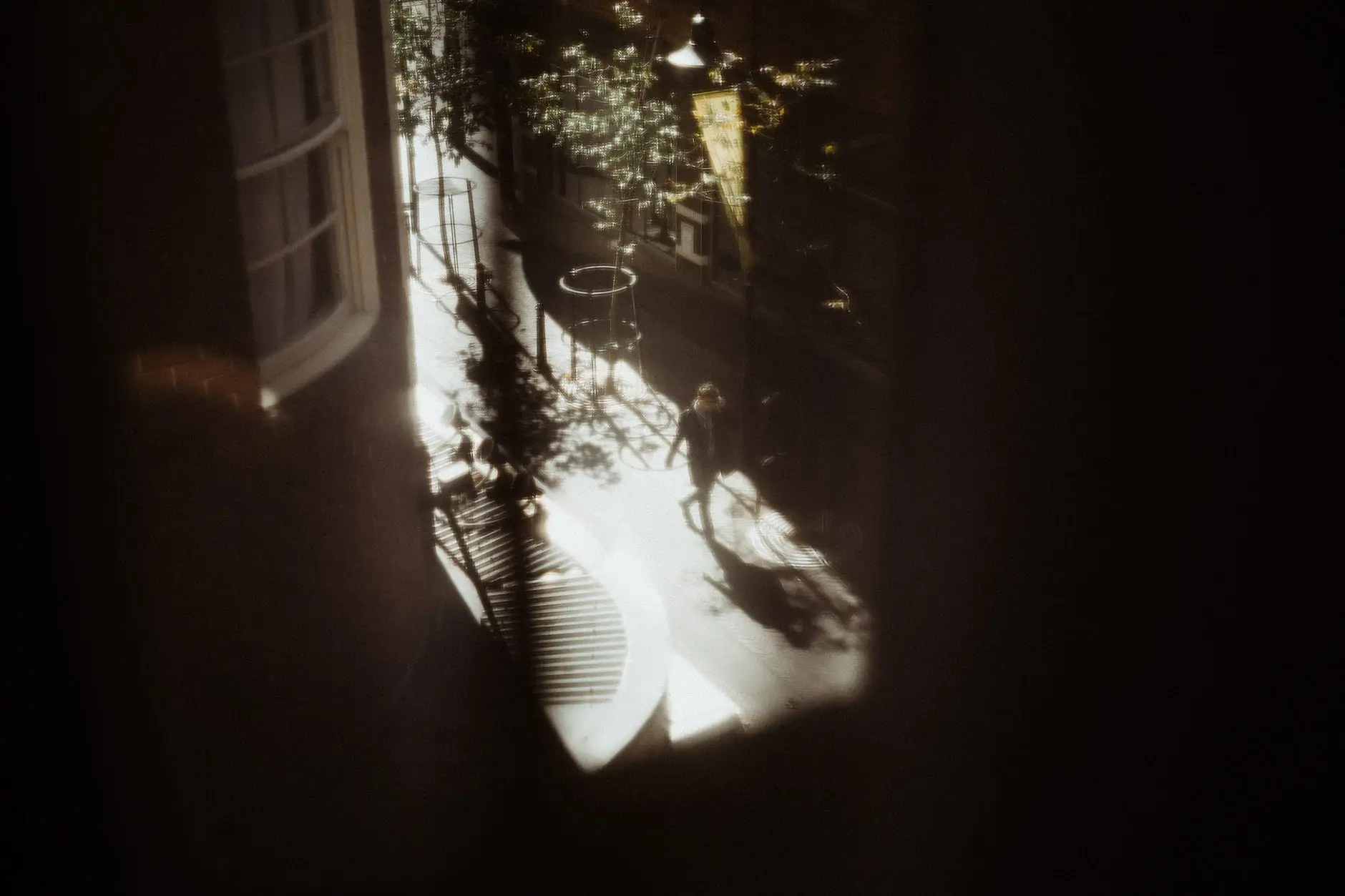 Late light and shadows falling across the hotel room floor, Chippendale