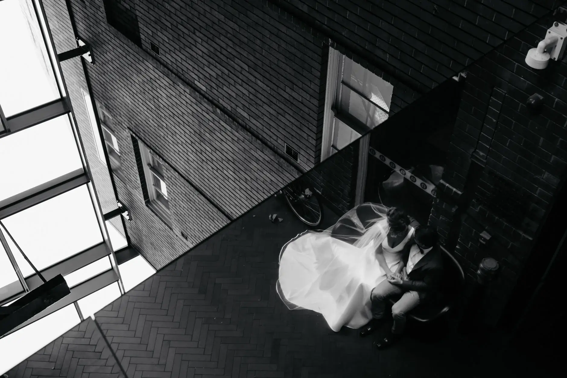 Looking down on Kath in the laneway from above, black and white, Chippendale