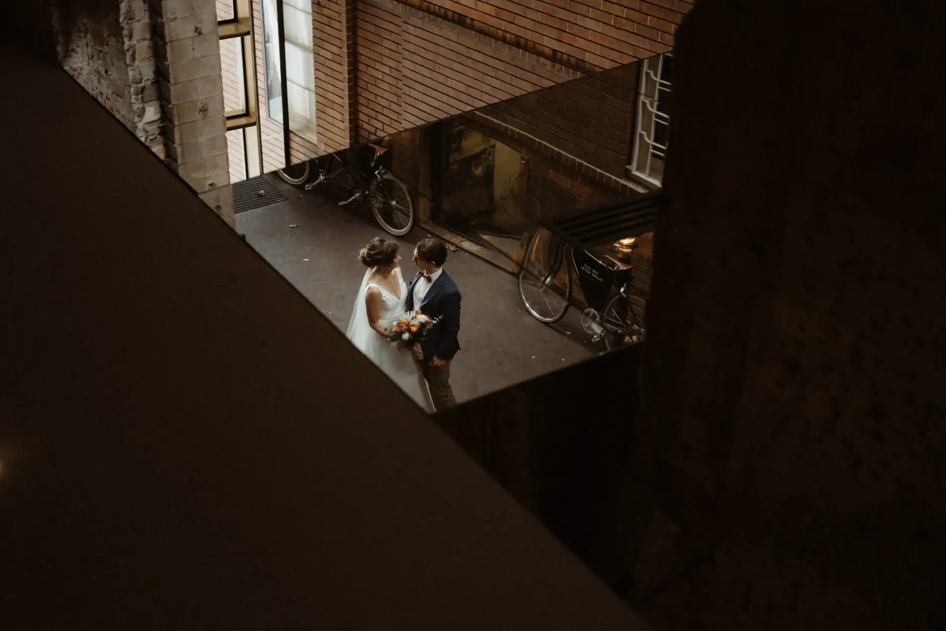Kath and Ross in the laneway seen from above, Chippendale