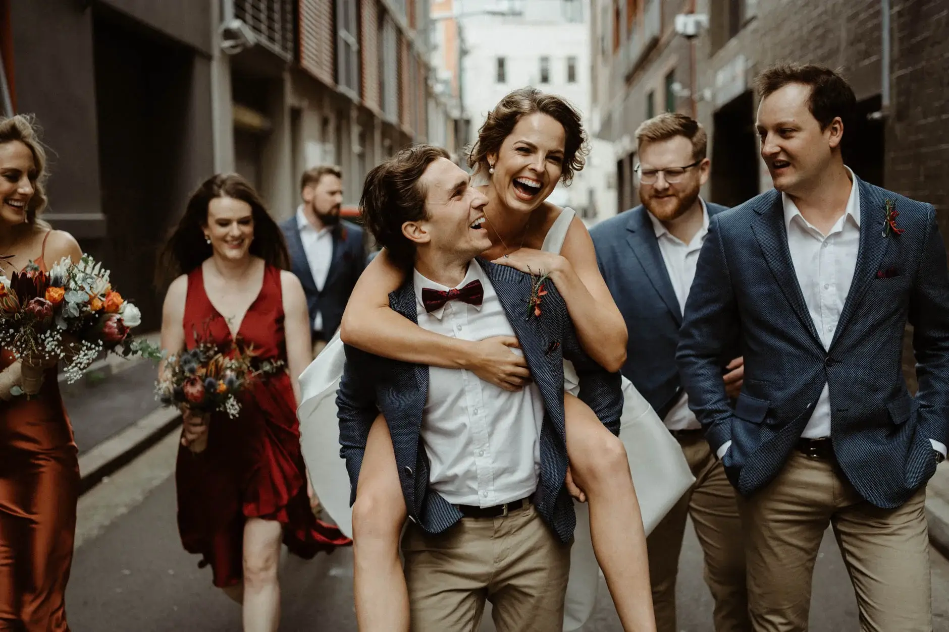 The bridal party laughing as they walk, Chippendale