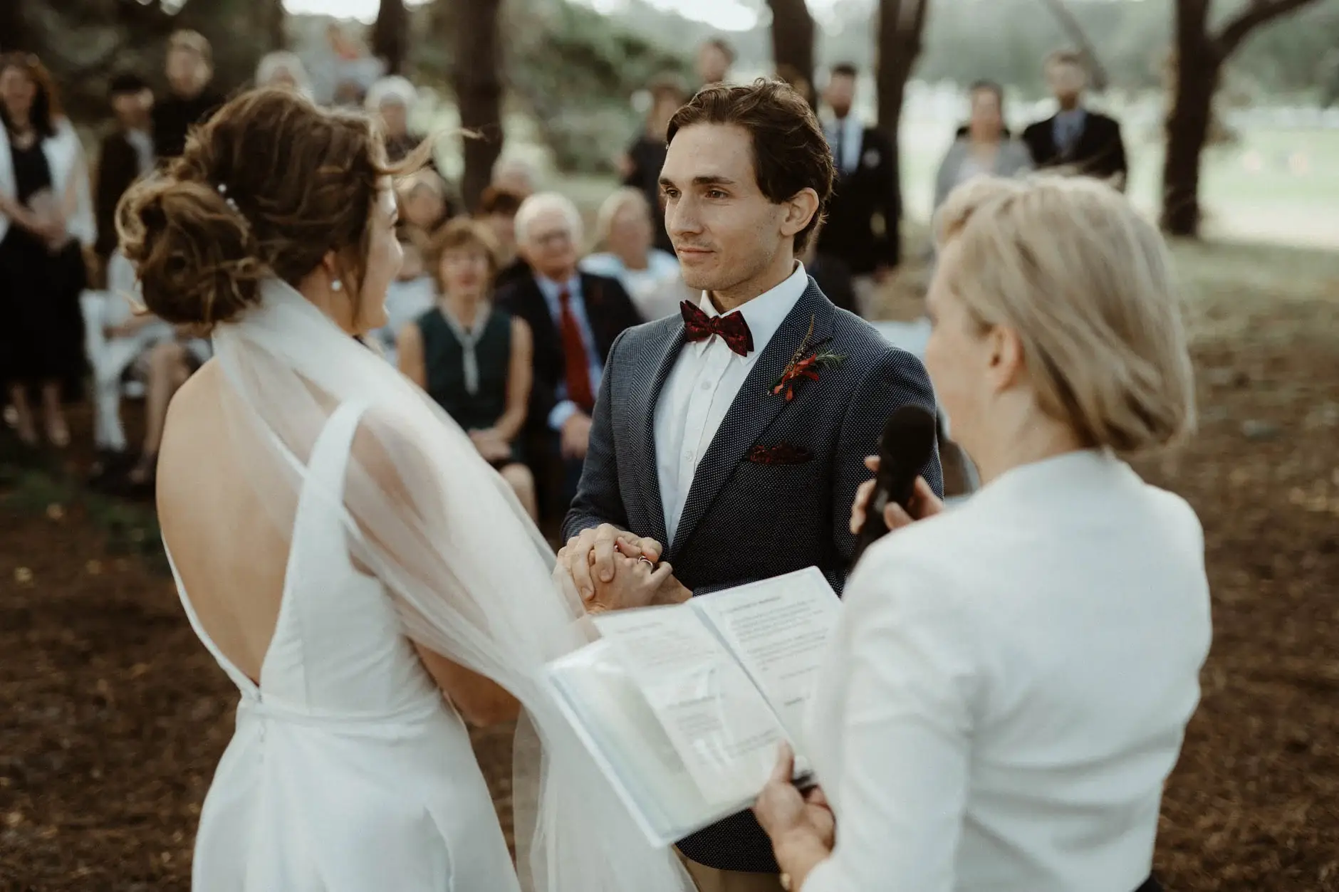 The celebrant reading between Kath and Ross, Centennial Park