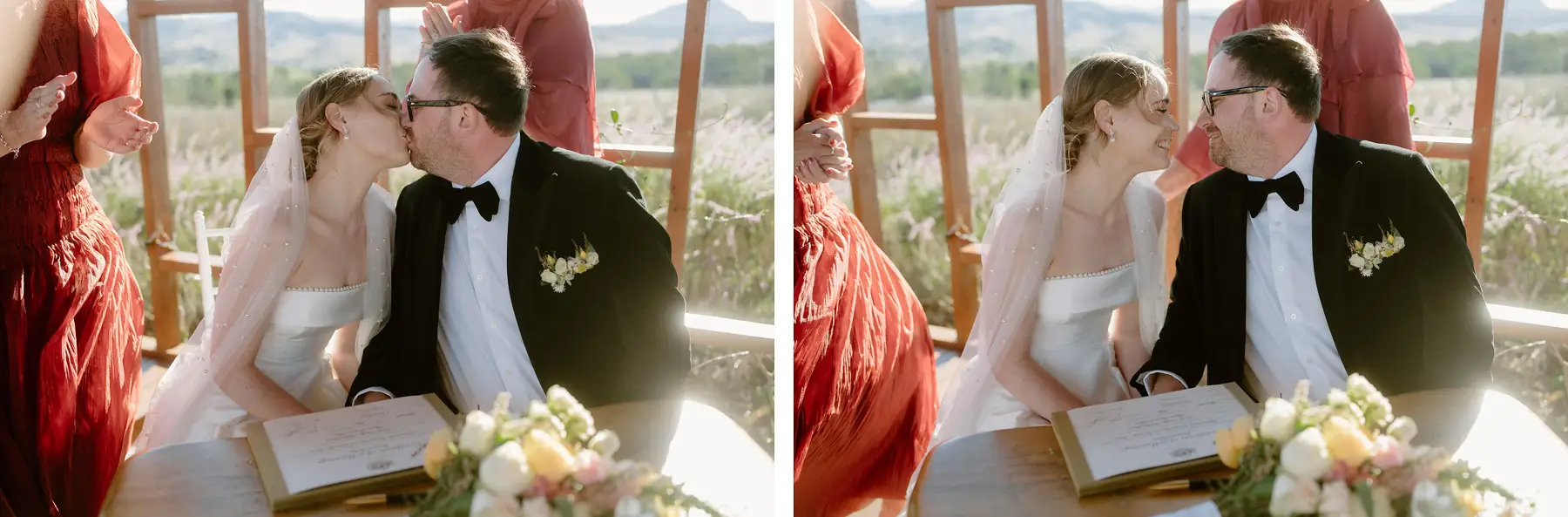 A kiss at the signing table, and the two of them signing the register, Kooroomba Vineyard and Lavender Farm