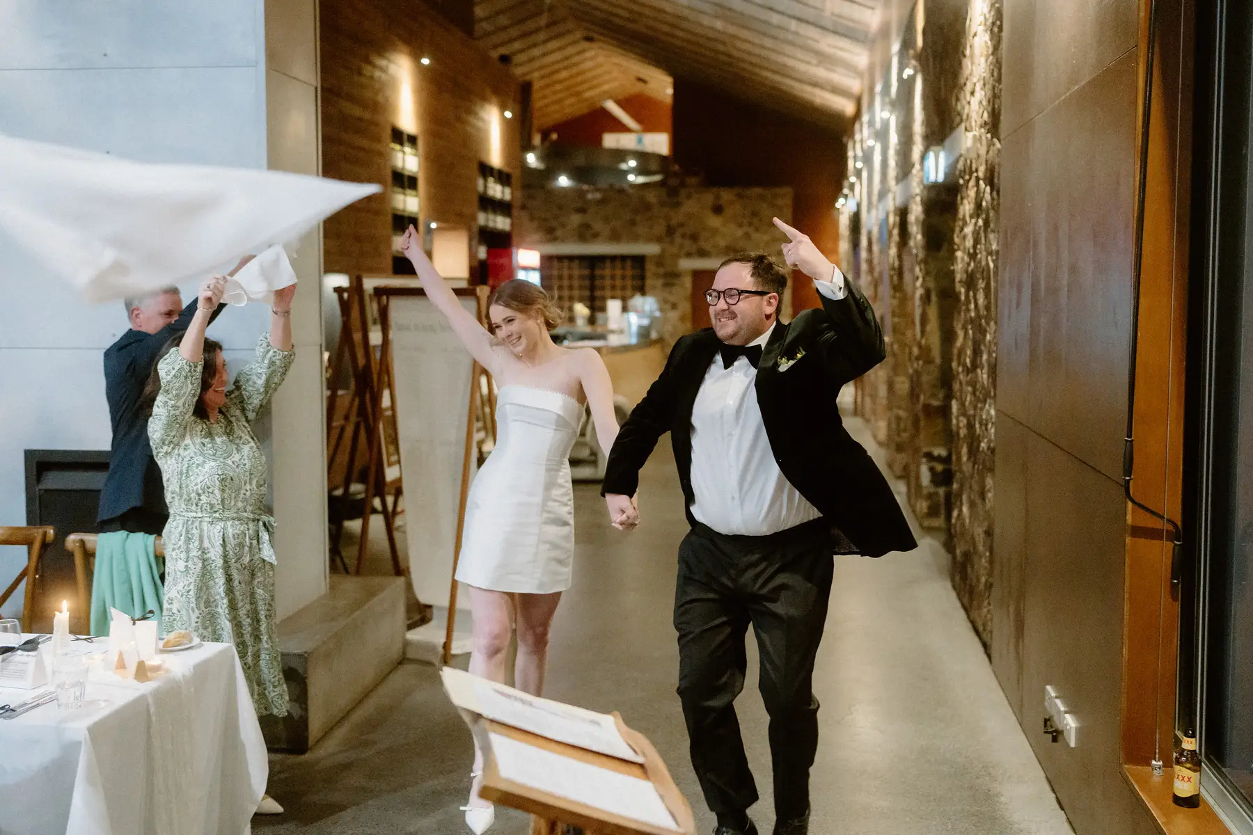Running back in for the reception in her short dress as the napkins go up, Kooroomba