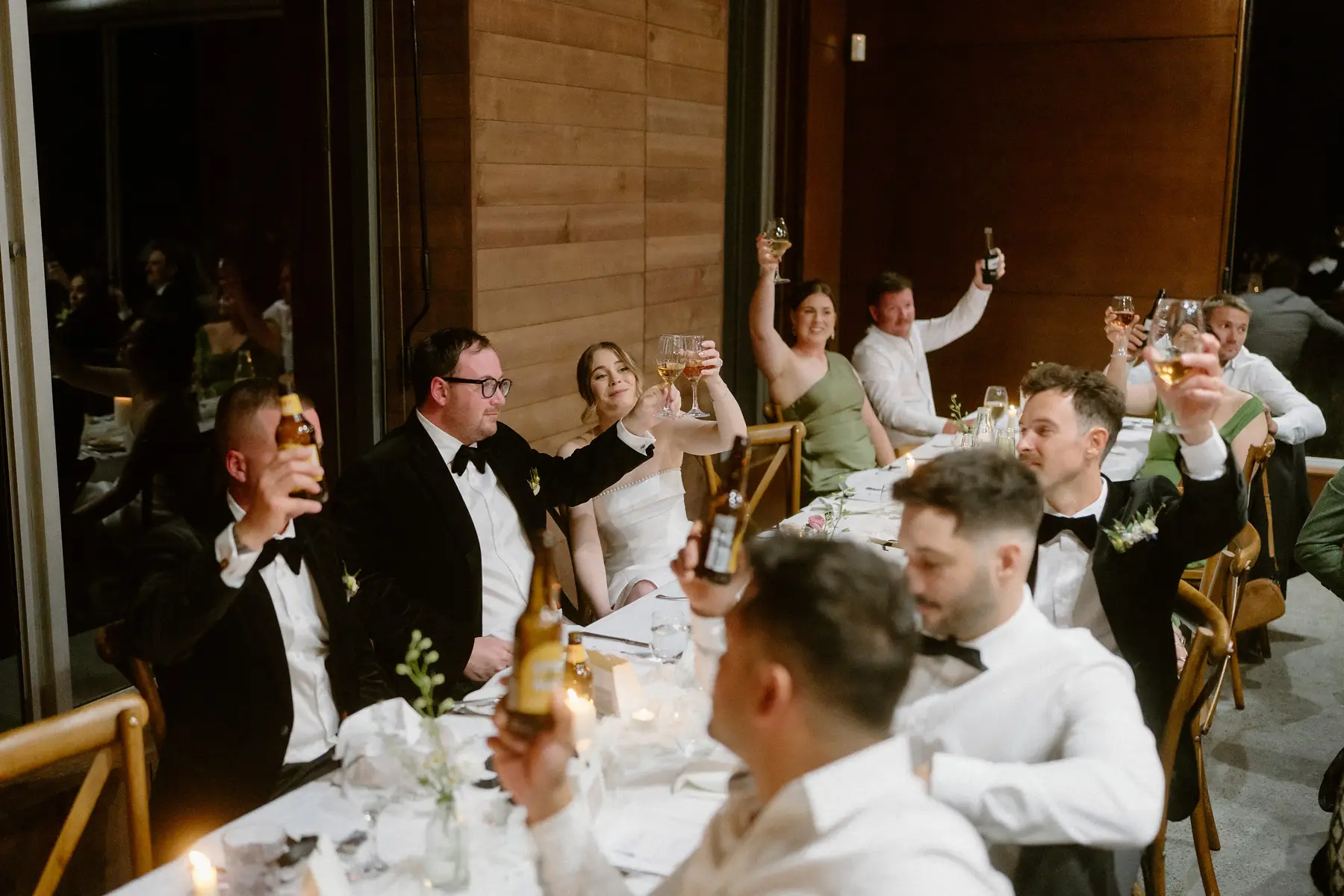 The long table mid-speech with glasses going up, Kooroomba