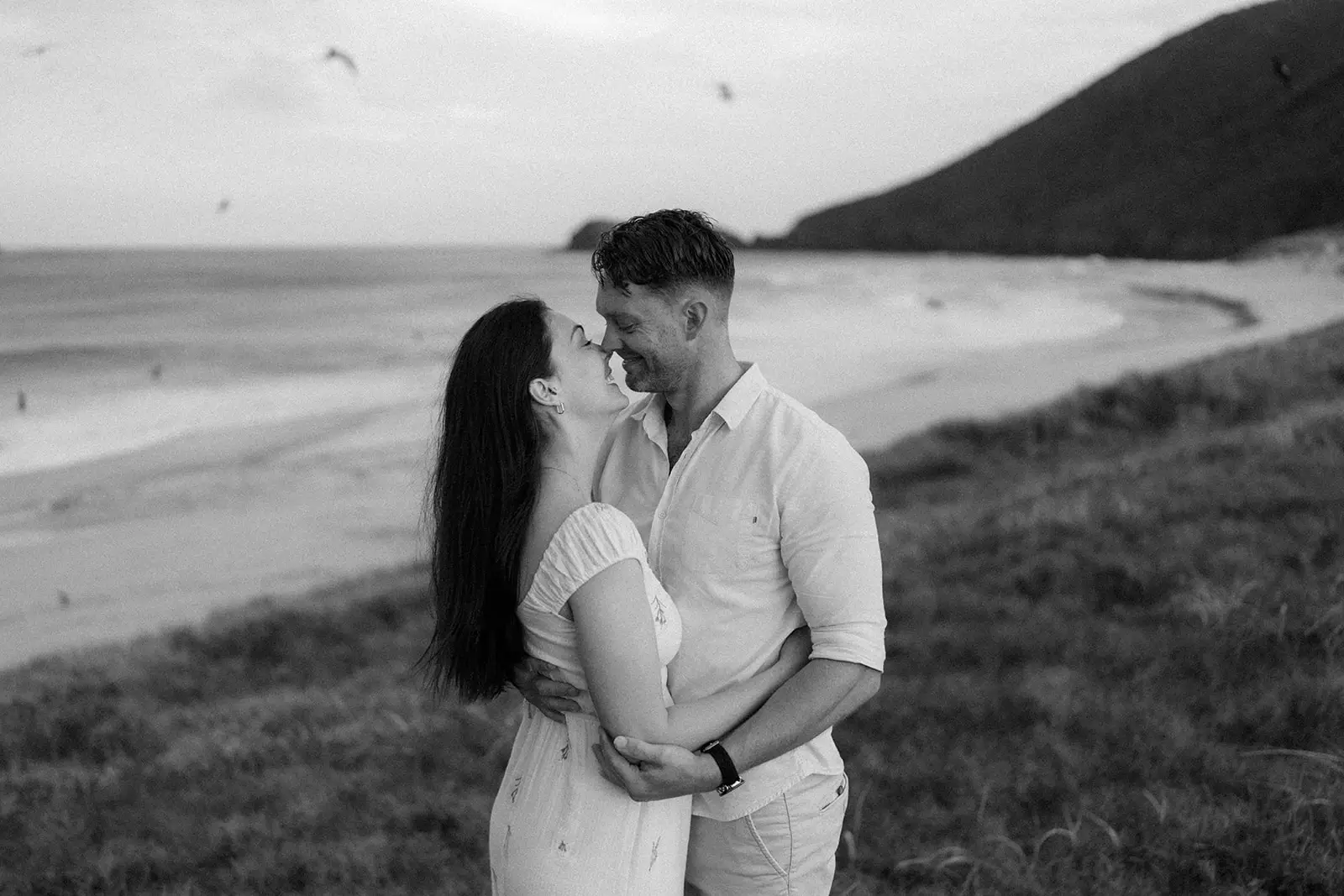 Close portrait of Mel and Brent above the beach, Lord Howe Island