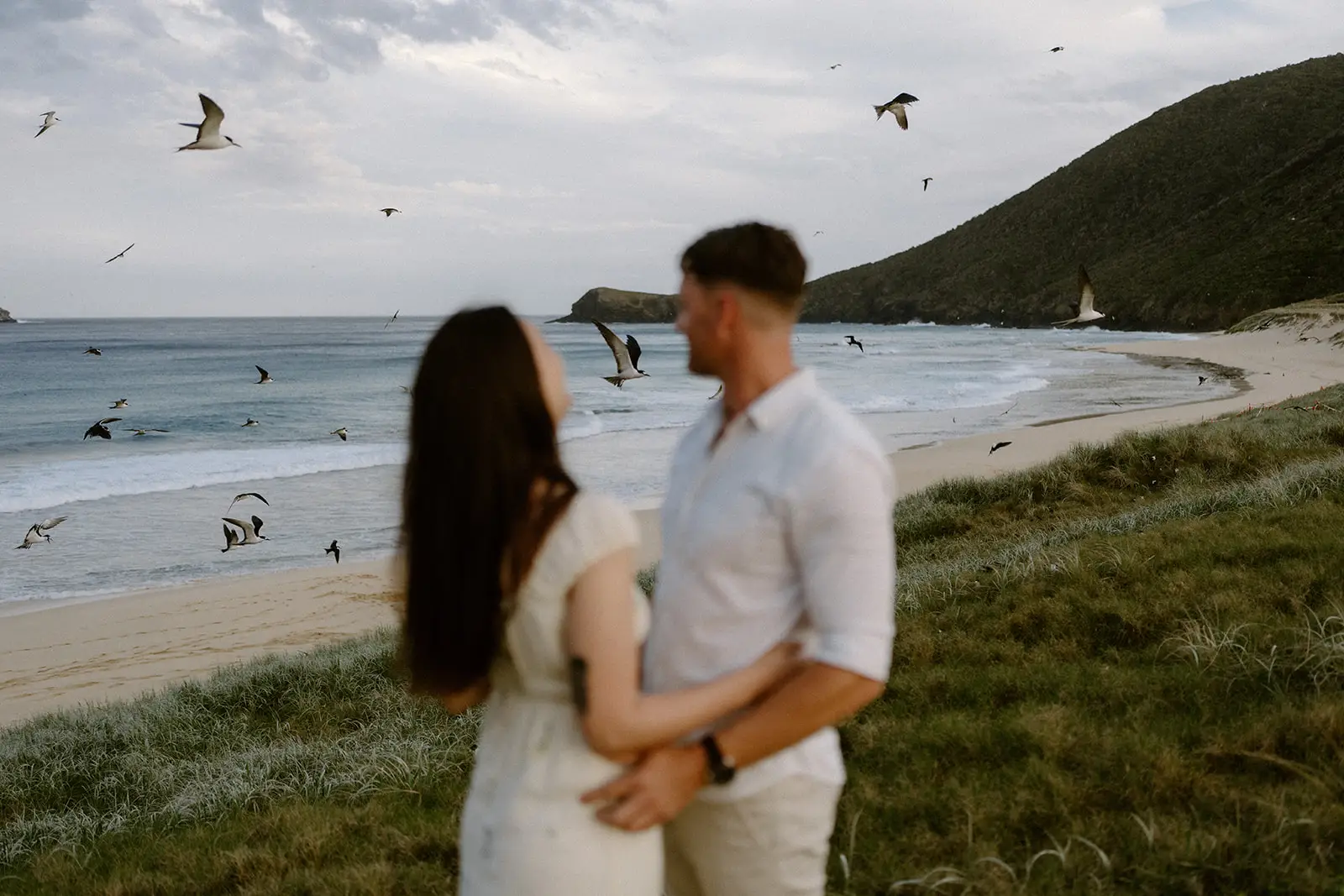 Mel and Brent on the clifftop with terns overhead, Lord Howe Island