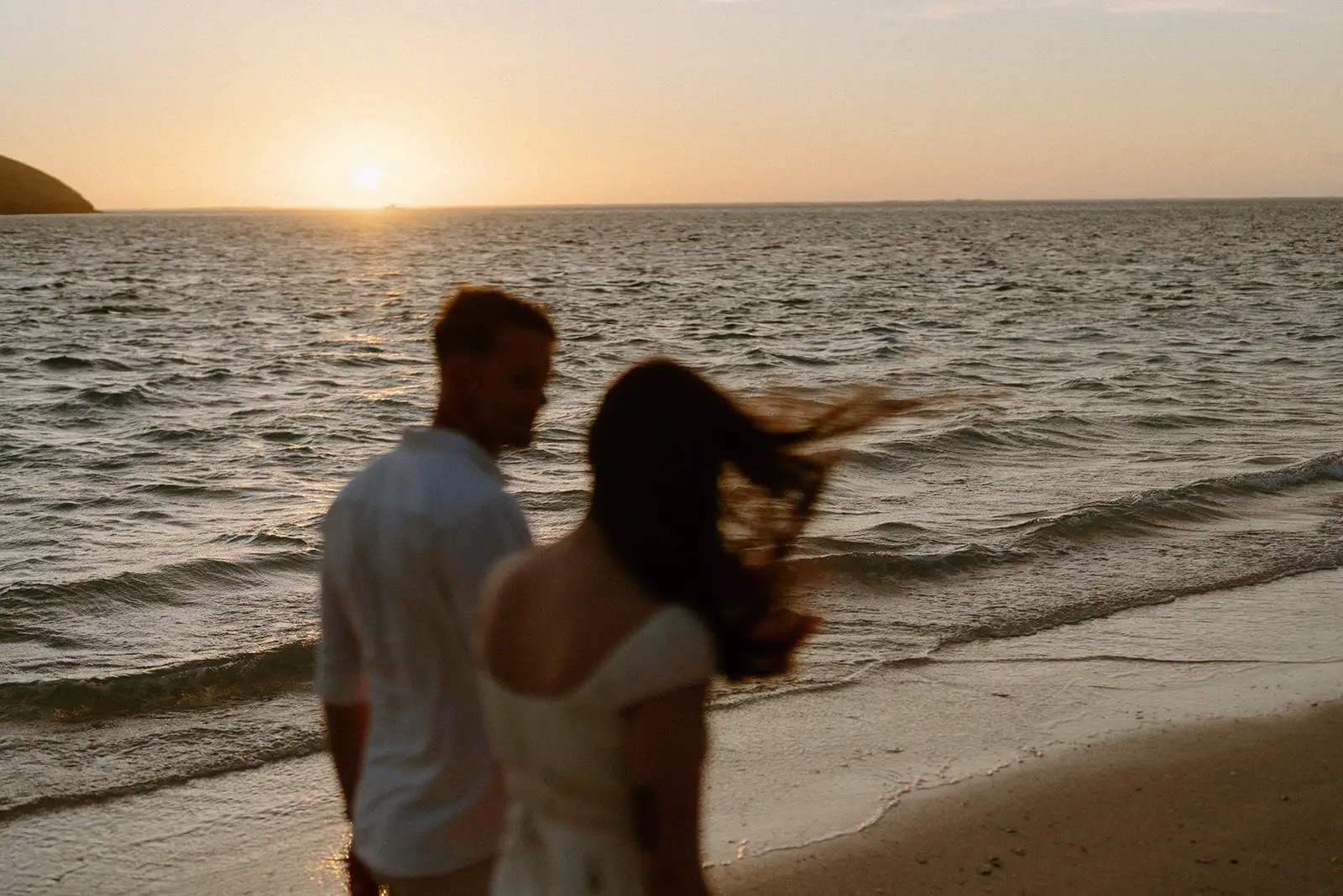 Mel and Brent watching the sun set over the water, Lord Howe Island