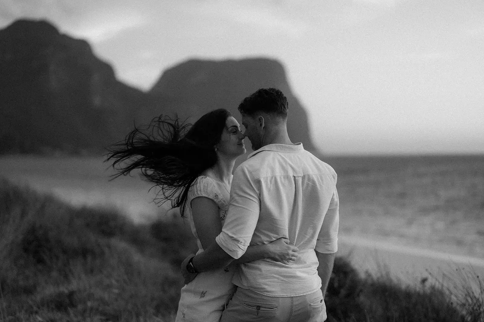 The couple looking out to sea in the wind, Lord Howe Island