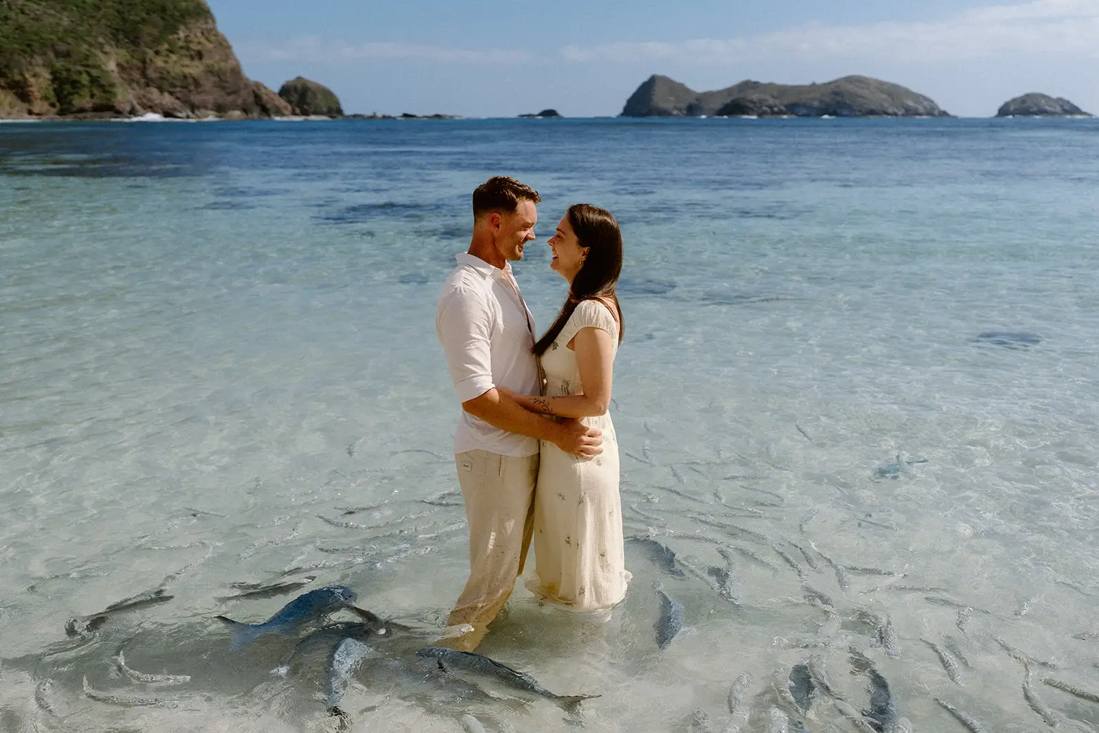 The couple embracing in the shallows, Lord Howe Island