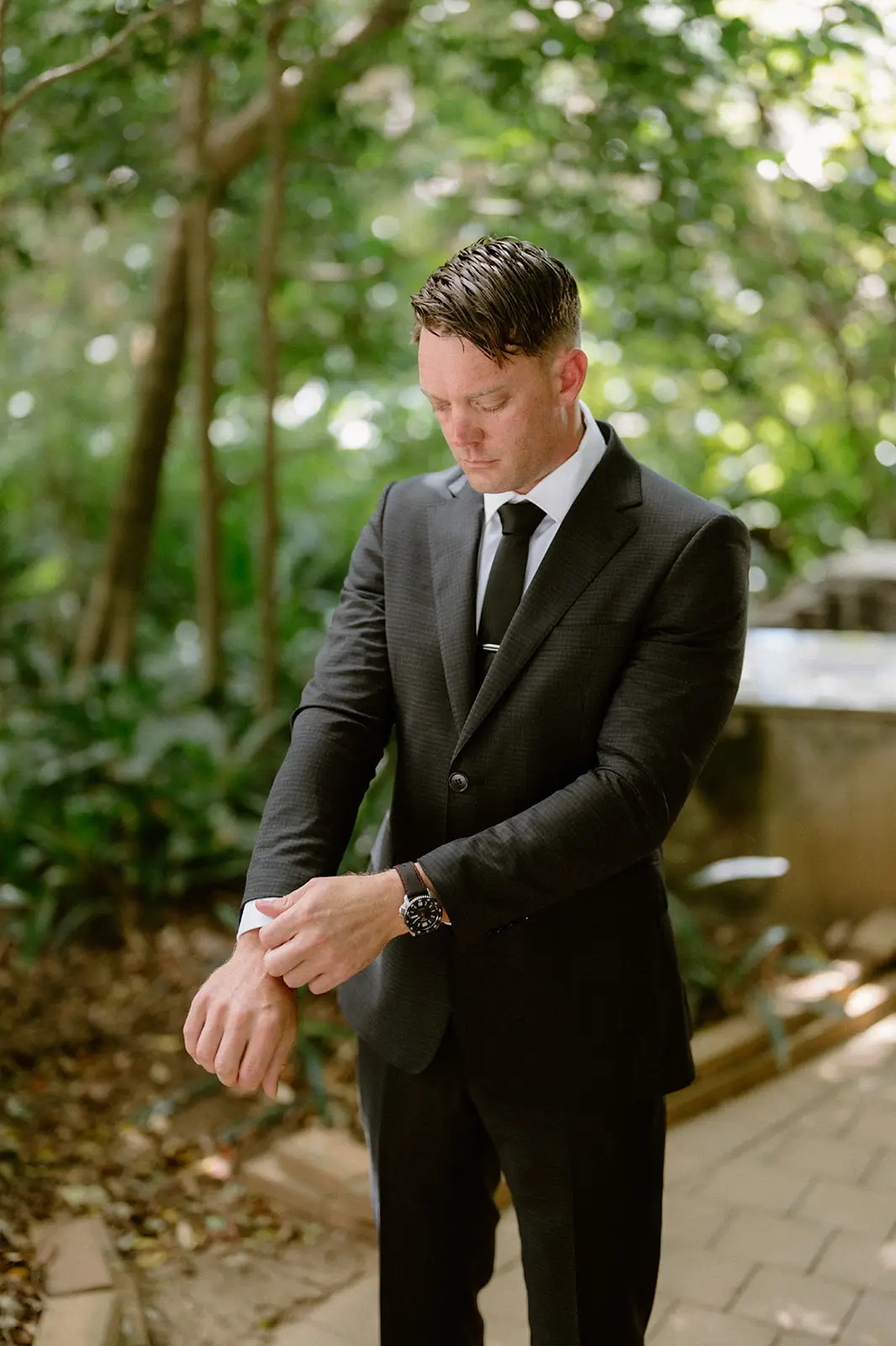 Brent in his suit among the palms before the ceremony, Lord Howe Island