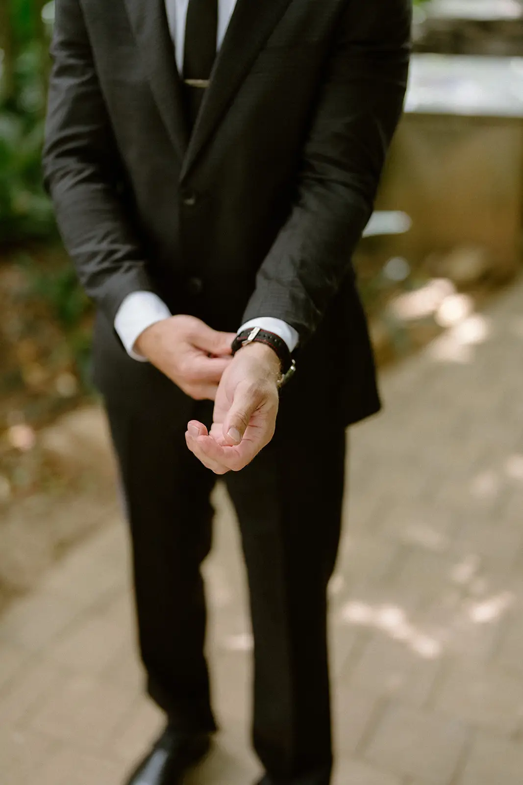 Brent waiting in his suit with his hands clasped before the ceremony, Lord Howe Island