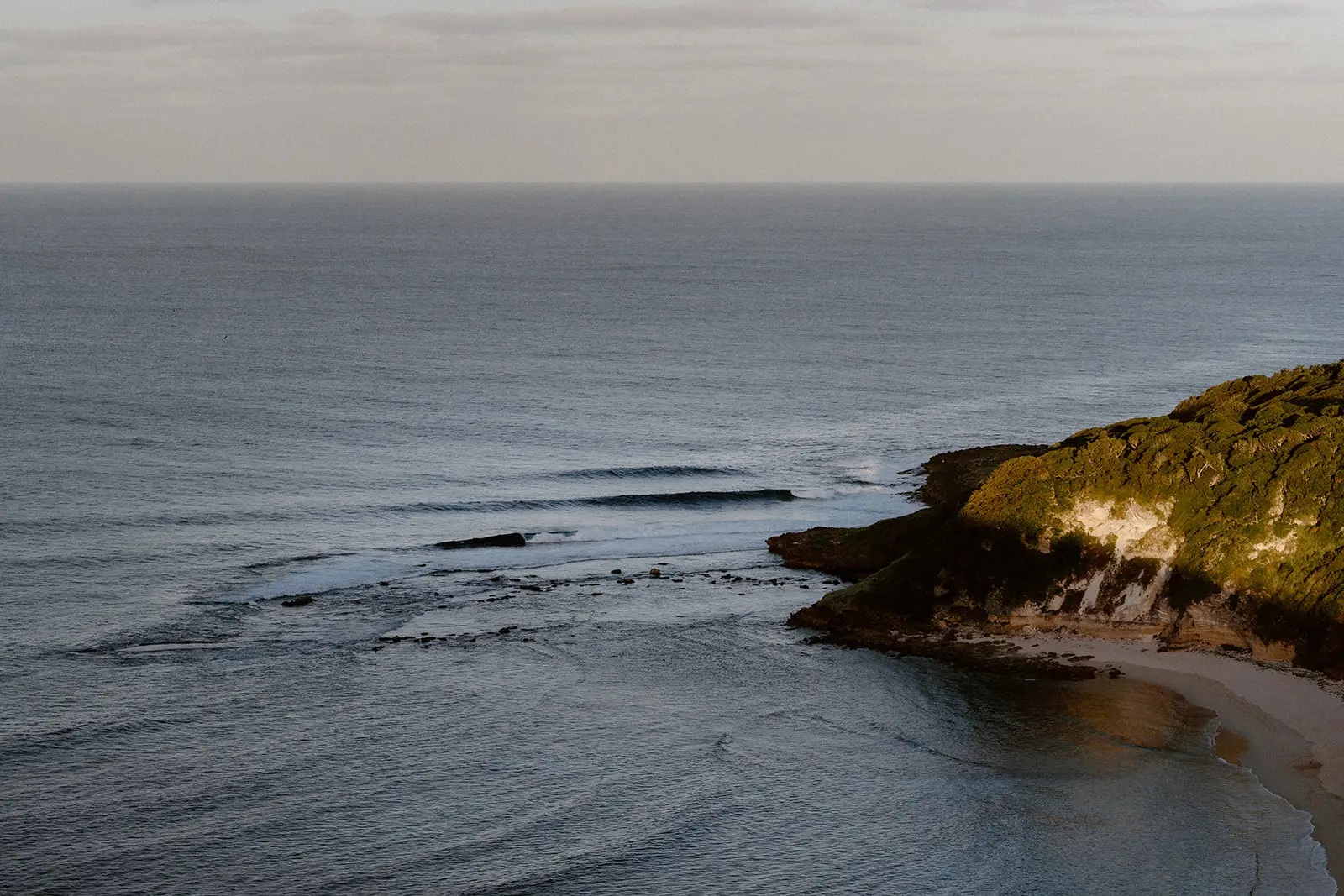 The rocky coastline and open sea from above, Lord Howe Island