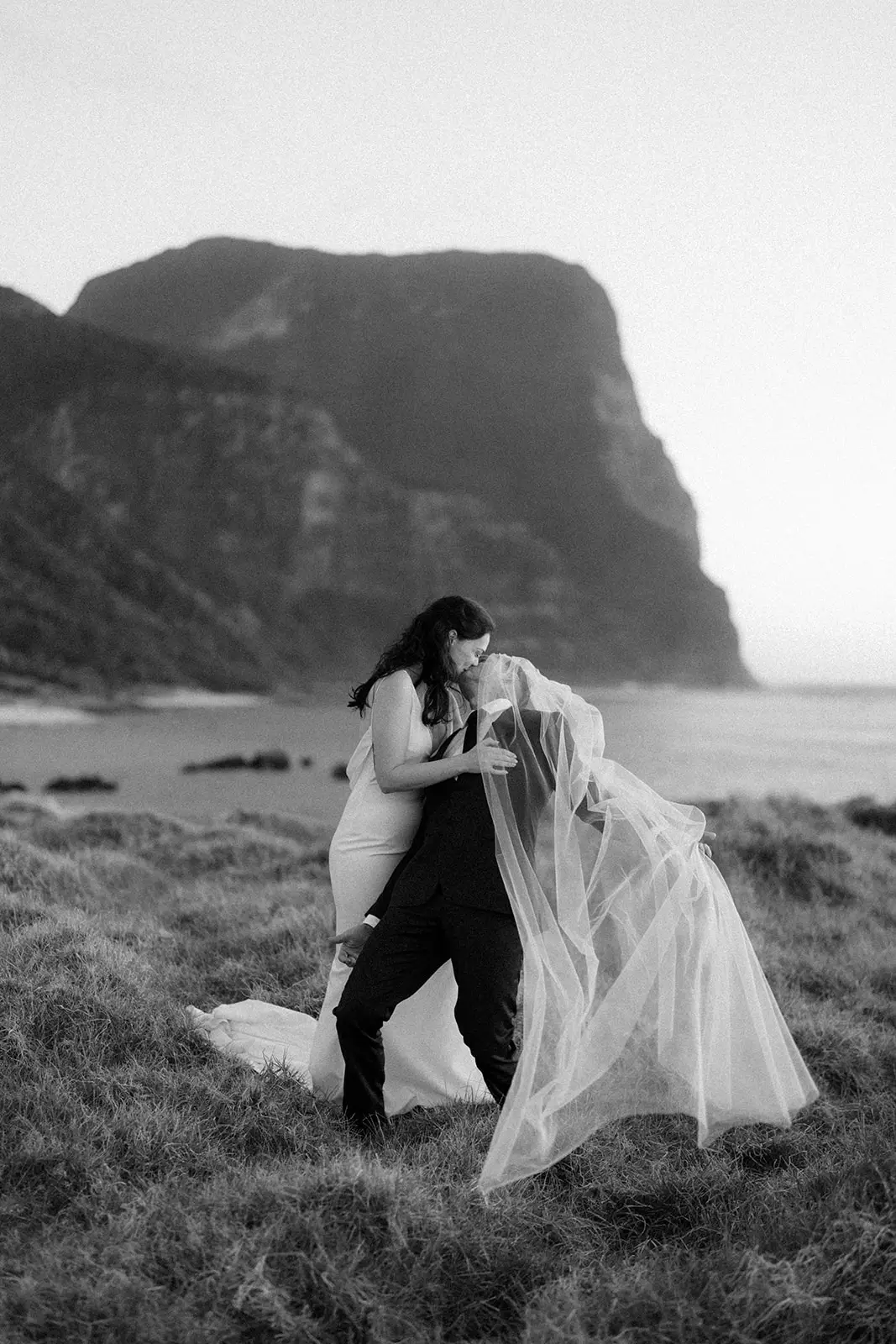The couple in the grass on Malabar Hill, Lord Howe Island