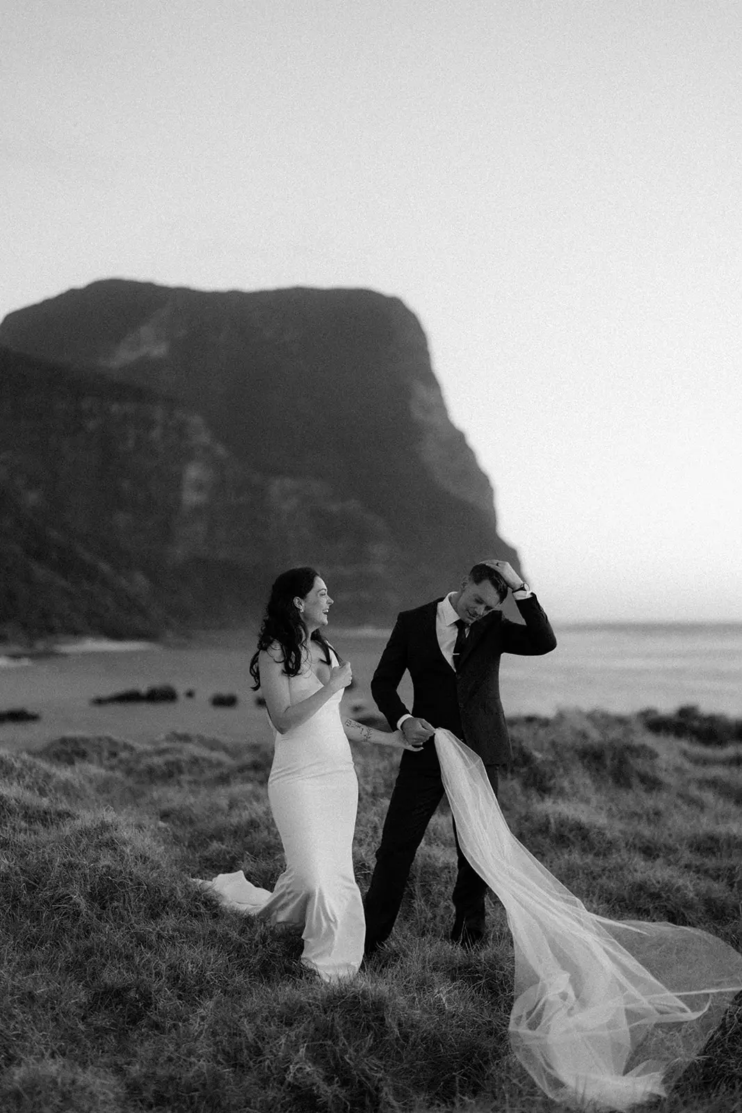 Mel's veil catching the wind on the clifftop, Lord Howe Island