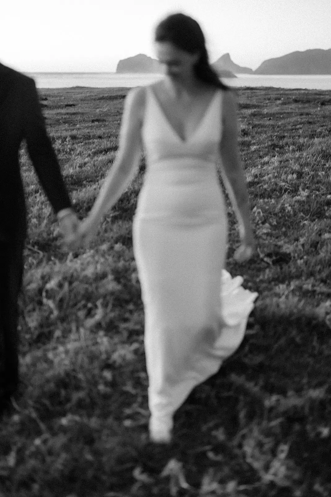 Mel walking through the grass in her veil, Lord Howe Island