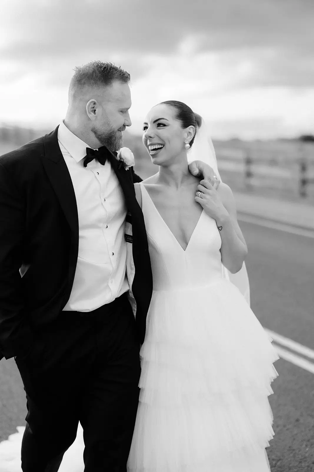 Black and white — laughing together on the walk back, Maleny Manor