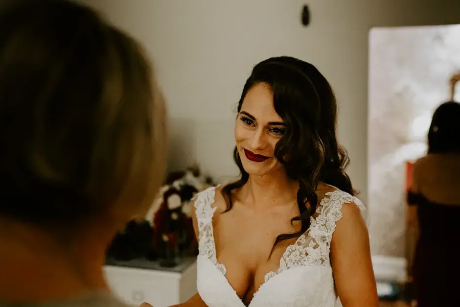 Amanda in her gown by the mirror before the ceremony, Riverside
