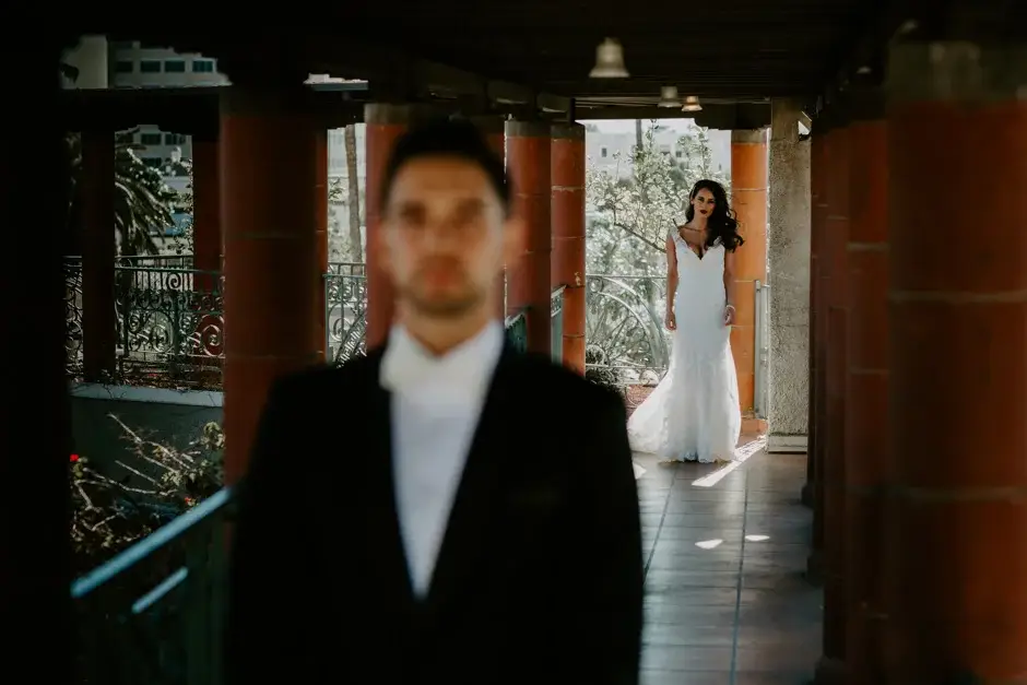 Aaron in the foreground as Amanda appears behind him, Riverside