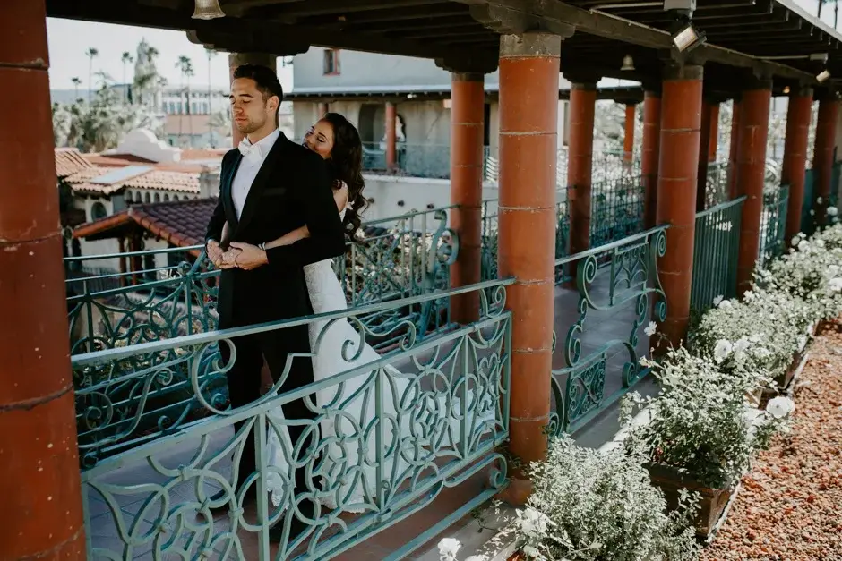 Aaron and Amanda meeting at the balcony railing, Riverside