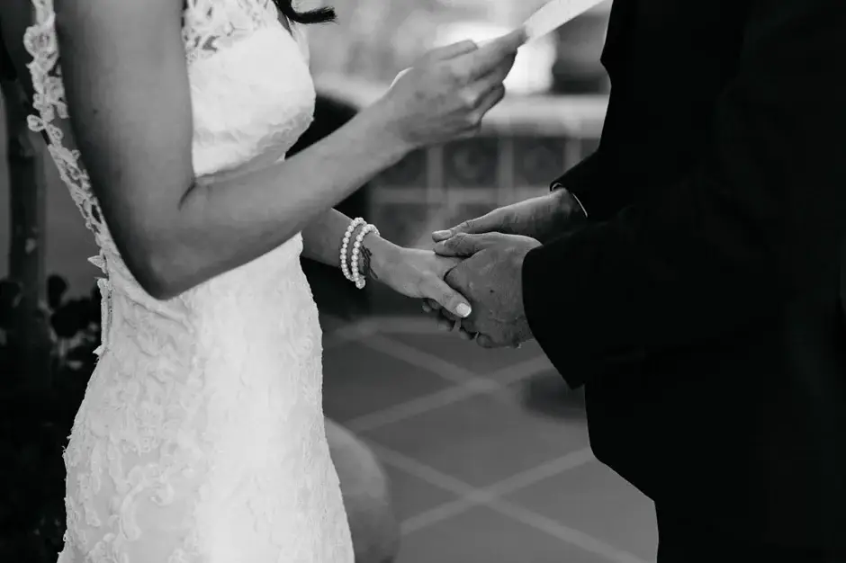 Their hands joined between them, black and white, Riverside